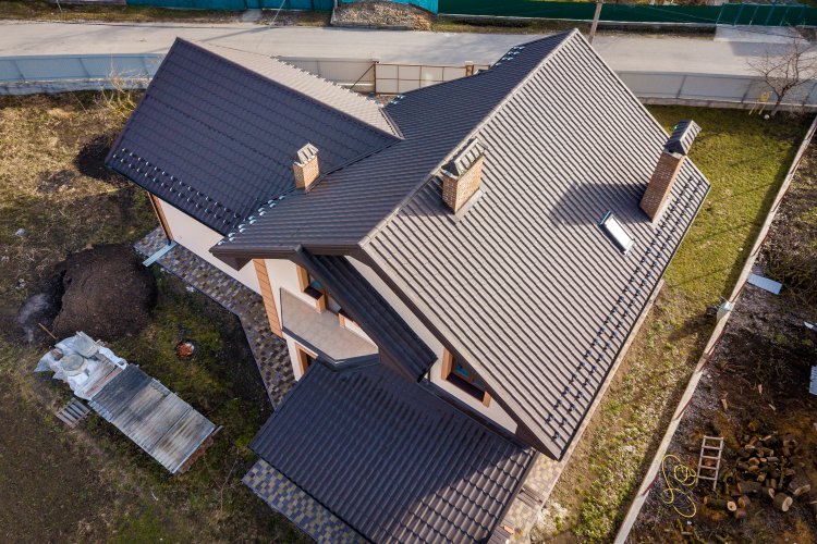 Residential home with tile roof installed by L and L Roofing in Davis California